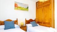 Postel nebo postele na pokoji v ubytování Home Victoria Playa Málaga