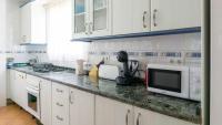 Kuchyň nebo kuchyňský kout v ubytování Home Victoria Playa Málaga
