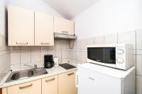Kuchyňa alebo kuchynka v ubytovaní Apartments Stefa
