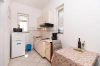 Kuchyňa alebo kuchynka v ubytovaní Apartments Stefa