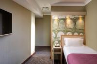 President Hotelにあるベッド