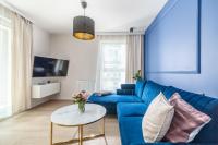 Telewizja i/lub zestaw kina domowego w obiekcie Unique Apartments - Angielska Grobla