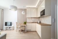 Kuchnia lub aneks kuchenny w obiekcie Unique Apartments - Angielska Grobla