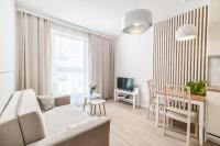 Telewizja i/lub zestaw kina domowego w obiekcie Unique Apartments - Angielska Grobla
