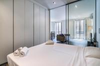Posteľ alebo postele v izbe v ubytovaní San Maurilio Apartment