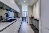 Kuchyňa alebo kuchynka v ubytovaní San Maurilio Apartment