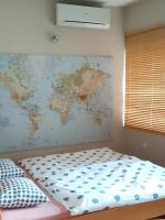 Łóżko lub łóżka w pokoju w obiekcie Rita apartman