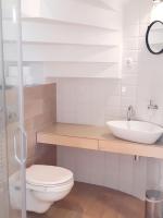 Łazienka w obiekcie Rita apartman