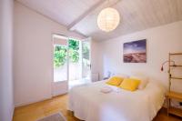 Villa Magalinette - Maison pour 6 avec piscine tesisinde bir odada yatak veya yataklar