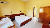 A bed or beds in a room at Cactus rooms