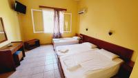 A bed or beds in a room at Cactus rooms