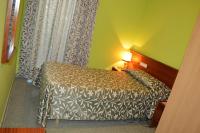 Posteľ alebo postele v izbe v ubytovaní Hotel Don Pelayo