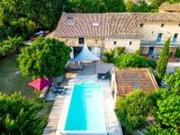 an overhead view of a swimming pool in a yard at Holiday Home Le Mas d&#39;Adélaïs by Interhome in Baron
