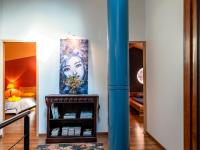 a blue pole in a room with a painting on the wall at Holiday Home Le Mas d&#39;Adélaïs by Interhome in Baron