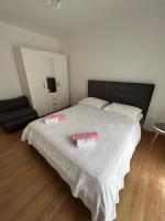 Posteľ alebo postele v izbe v ubytovaní Apartmani Peco Duće