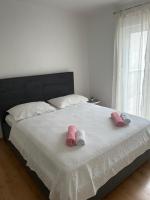 Posteľ alebo postele v izbe v ubytovaní Apartmani Peco Duće