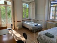 Postel nebo postele na pokoji v ubytování Room in Lisbon centre