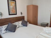 Posteľ alebo postele v izbe v ubytovaní Panaramico Superior Apartments LILI with Sea view in Dramalj