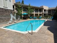 a swimming pool in front of a building at Holiday Inn Express Hotel & Suites San Dimas by IHG in San Dimas