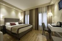A bed or beds in a room at Hotel Forte del 48