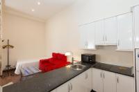 Kuchyňa alebo kuchynka v ubytovaní Apartamentos Deluxe Calle Corredera