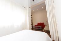 Posteľ alebo postele v izbe v ubytovaní Apartamentos Deluxe Calle Corredera