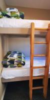 Stay Hostel Rotoruaにあるベッド