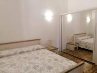 Postel nebo postele na pokoji v ubytování CASA VERDINA, nel cuore di Alghero