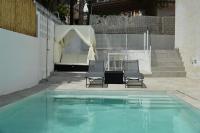 Bazén v ubytování Villa en primera línea de mar con piscina privada nebo v jeho okolí