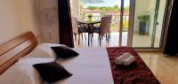Postel nebo postele na pokoji v ubytování Apartments Rotim