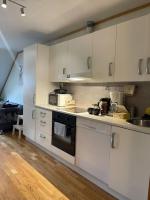 Kuchyň nebo kuchyňský kout v ubytování City Center Stylish Loft