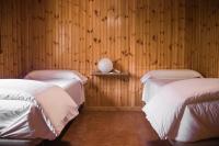 A bed or beds in a room at Gaztainuzketa Mendi Etxeak