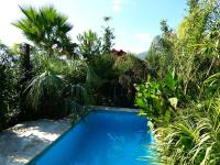 Bazén v ubytovaní Villa Tropica, total privacy, tropical garden and private pool alebo v jeho blízkosti