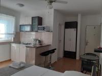 A cozinha ou cozinha compacta de Apartments Begonia