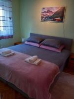 Posteľ alebo postele v izbe v ubytovaní Apartman 4