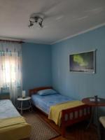 Posteľ alebo postele v izbe v ubytovaní Apartman 4