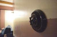a close up of a door knob on a wall at Appartement design à la bourse du commerce in Paris