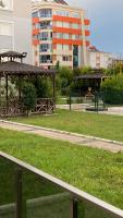 a park with a gazebo and green grass at Serenity Apart in Antalya