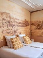 Ein Bett oder Betten in einem Zimmer der Unterkunft 't Hotel