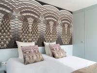 Ein Bett oder Betten in einem Zimmer der Unterkunft 't Hotel