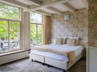 Ein Bett oder Betten in einem Zimmer der Unterkunft 't Hotel