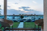 a view of a parking lot from a balcony at NERO SEASCAPE SUITES in Fanari