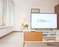 TV a/nebo společenská místnost v ubytování Oliveiras Charming Apartment Downtown