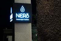 a sign on the side of a building at NERO SEASCAPE SUITES in Fanari