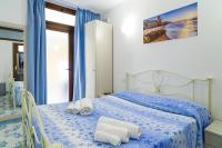 Posteľ alebo postele v izbe v ubytovaní Hotel La Marina