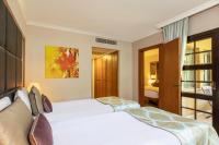Postel nebo postele na pokoji v ubytování Asteria Family Resort Belek