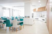 En restaurant eller et andet spisested på Vitors Plaza