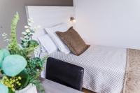 Postel nebo postele na pokoji v ubytování Hotel Planas