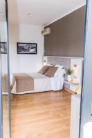 Postel nebo postele na pokoji v ubytování Hotel Planas