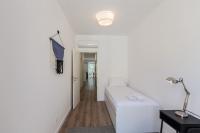 Postel nebo postele na pokoji v ubytování FLH Penha França Art Apartment